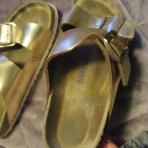 Birkenstocks gold sandals sz 38 or 7 Med hardly worn